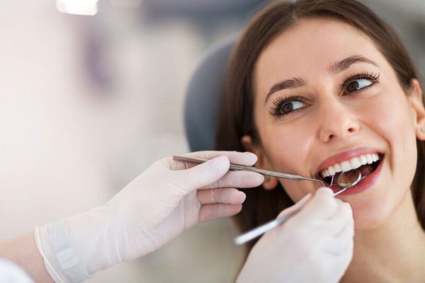 woman receiving a dental checkup